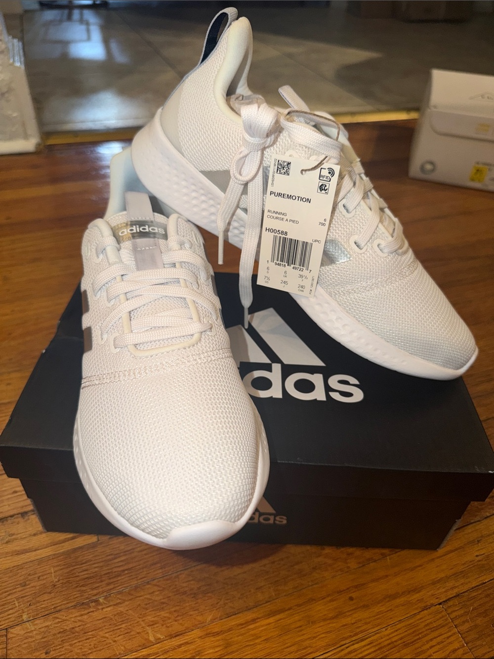 adidas women’s White Puremotion Lightweight Sneakers